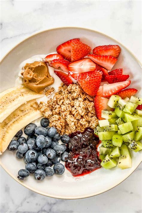 Peanut Butter Jam Yogurt Bowl with Granola & Berries - This Healthy Table