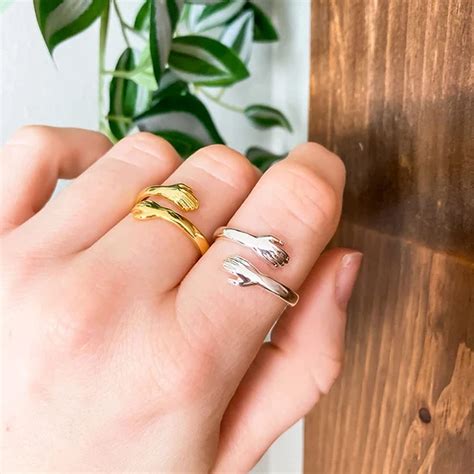 Yellow Chimes Rings for Women Gold & Silver Plated Hug Design Love ...