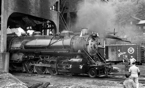 Workers and railfans gather around Baltimore & Ohio 2-8-2 #421 at the ...