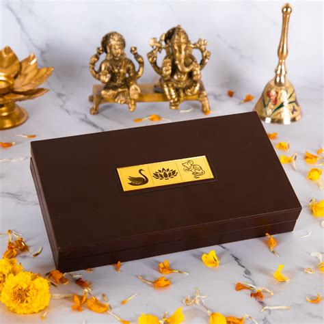 Gold Plated Lakshmi Ganesh Saraswati Charan Paduka in Brown Pooja Box ...
