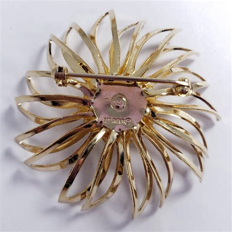 Sarah Coventry Ruby Red Crystal Gold Tone Curved Flower Pin Brooch at ...