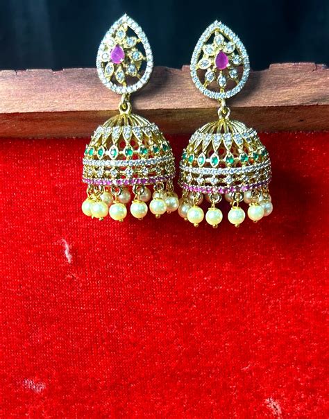 Pear-Shaped Stone Studded Jhumka Earrings – Chandrakalm