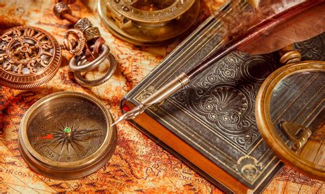 Vintage still life - magnifying glass, pocket watch, old book and goose ...