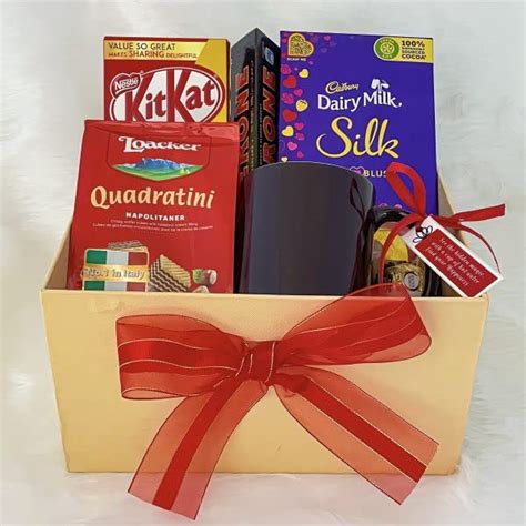 Angroos friendship day gift hamper with Elegant Toblerone, Mug, Loacker ...