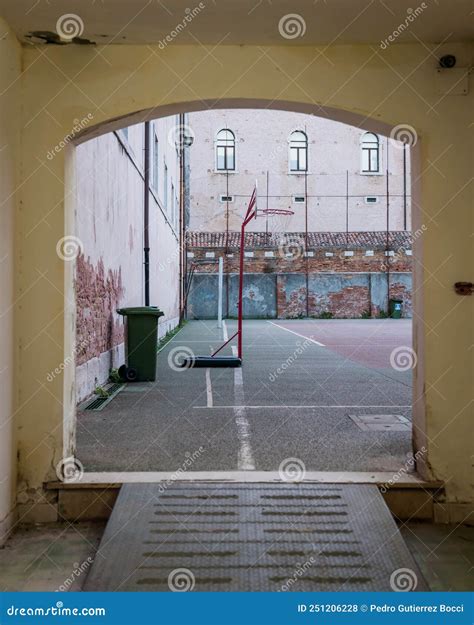 Outdoor School Basketball Court Framed by Entrance in Italy Stock Photo ...