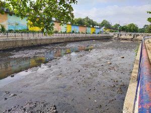 Such preparation for rain Kanh river many drains full garbage silt ...