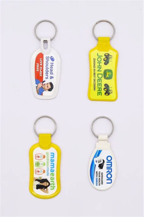 KEY CHAINS - Metal Golden Meena Keychain Manufacturer from New Delhi