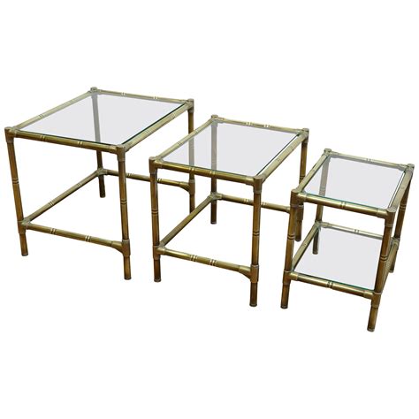 Set Of Three Brass And Antique Glass Nesting Tables at 1stDibs