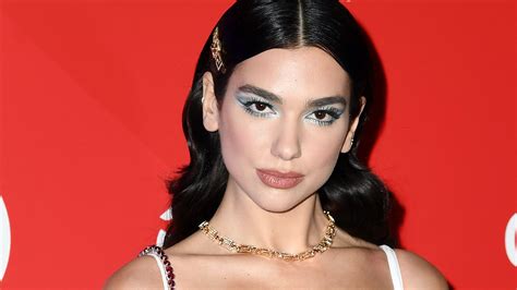 Dua Lipa's Christmas Manicure Features Religious Symbols in Vibrant ...