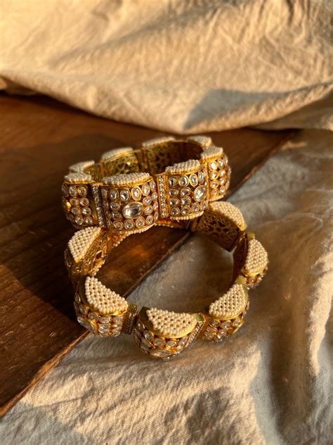 Half Scalloped motif Gold plated Kangan with gem jali design ...