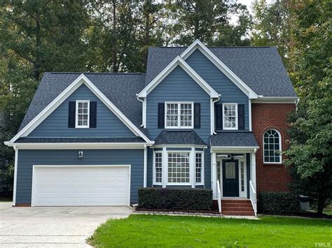 Dark Blue House Black Shutters
