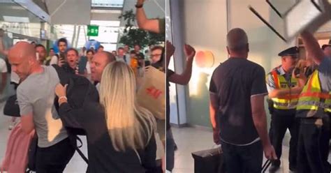 Video: Angry football fans heckle referee and his family, throw chair ...