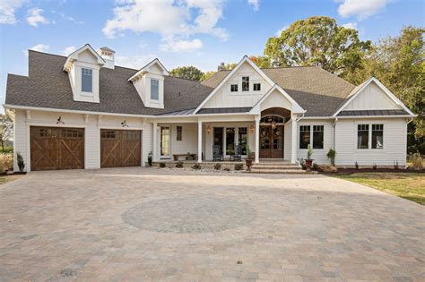 French Country Kitchen with Brick Backsplash and Viking Range