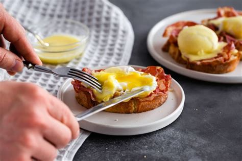 Eggs benedict- toasted english bread, parm ham, poached eggs with ...