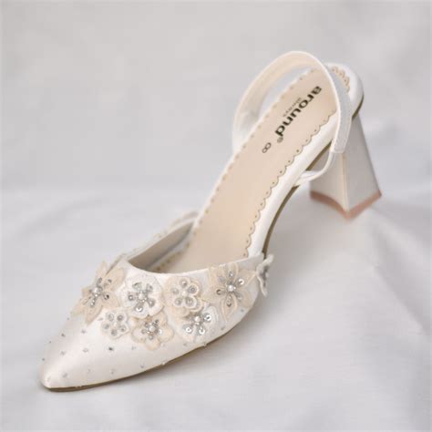 Buy Bliss Slip-on Mules | Intricate White Floral Wedding Heels ...