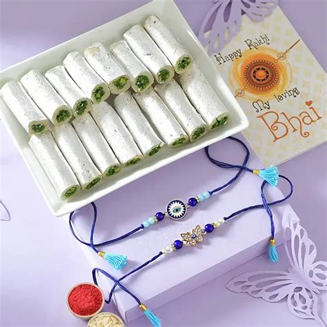 Send Guardian Eye Rakhi and 340gm Kaju Roll Online | Rakhibazaar.com