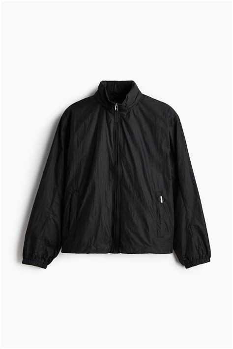 Regular Fit Water-repellent windbreaker - Black - Men | H&M IN