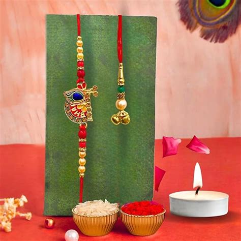 DRYPHON Bansuri Peacock Feather Rakhi for Brother and Bhabhi | Lumba ...