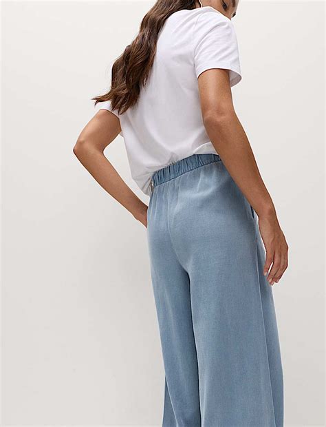 Buy Lyocell Blend Pull On Wide Leg Trousers at Marks & Spencer