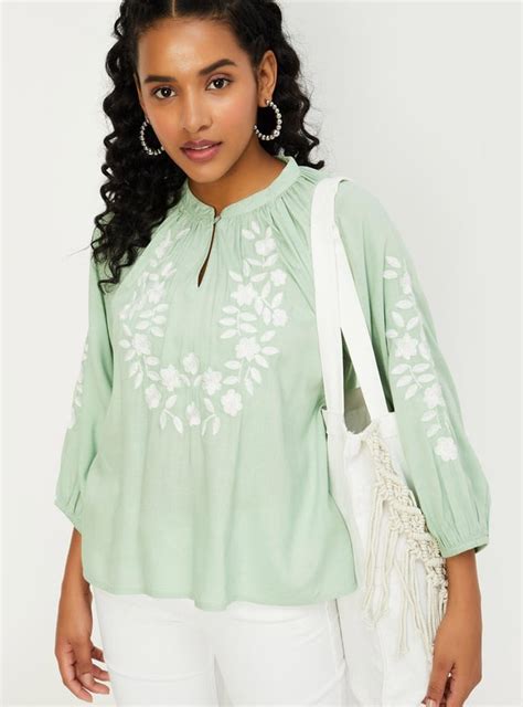 Buy Women Embroidered Tie-Up Neck Top Online at just Rs. 799.0 ...