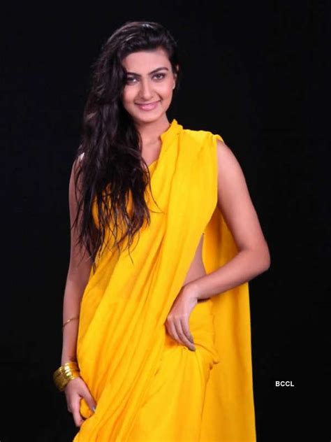 Neelam Upadhyay shows off her curves in a sleeveless bikini blouse and ...