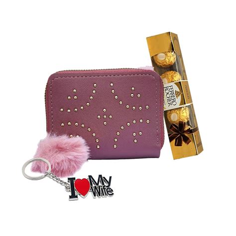 A Hand Clutch With Dairy Milk Silk Chocolate And I Love You Key chain ...