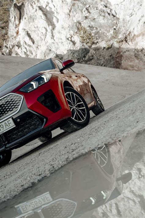 New BMW iX2 xDrive30 – Fire Red Metallic/ Veganza perforated Atlas Grey ...