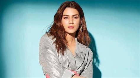 Kriti Sanon in mini blazer dress with pink waist belt aces shimmer ...