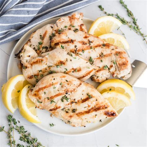 chicken with lemon and herbs Whole lemon herbs and garlic roasted ...