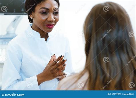 Gynecologist Showing Woman Early Ultrasounds of Her Pregnancy Stock Image - Image of medicine ...