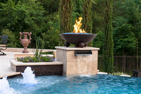 https://st.hzcdn.com/simgs/pictures/pools/pool-remodel-featuring-beautiful-copper-fire-bowls-custom-pool-concepts-img~cd113837073b96f1_9-7197-1-b272618.jpg
