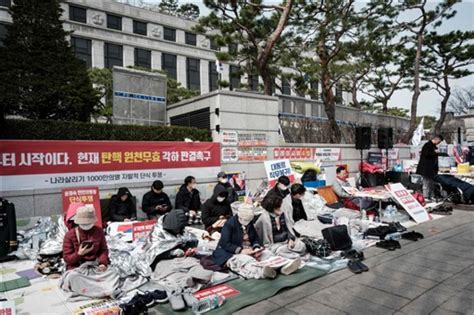 IN PHOTOS Thousands rally in Seoul as South Koreas court weighs Yoon ...