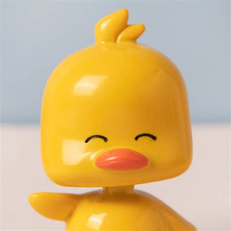 Happy Ducky Bobble Head Showpiece Online - Premium Decor Object | Nestasia