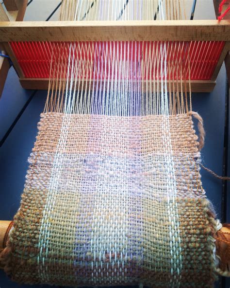 I finally mustered up the courage to weave with my handspun yarn, and ...