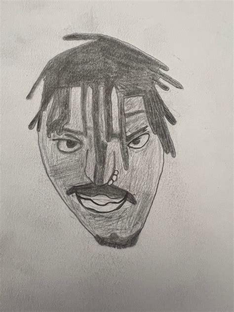 My attempt on drawing Juice Wrld I’m not really good at drawing faces but I tried I hope y’all ...