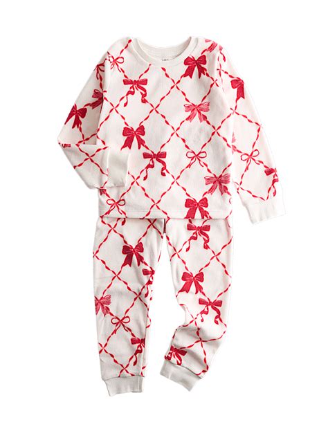 Buy Fleece Bow Graphic Pyjamas (1-16 Yrs) at Marks & Spencer
