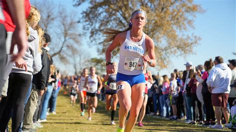 Van Meter girls cross country wins state title, football continues postseason run