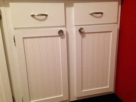 Beadboard wallpaper cabinets