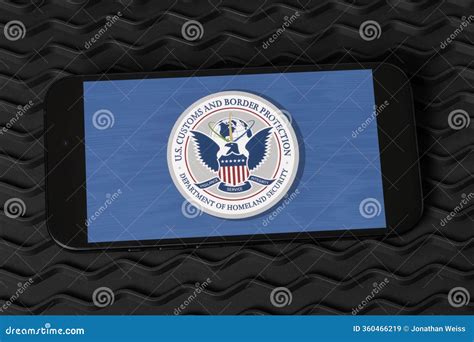United States Customs and Border Protection Logo on a Smartphone. the ...