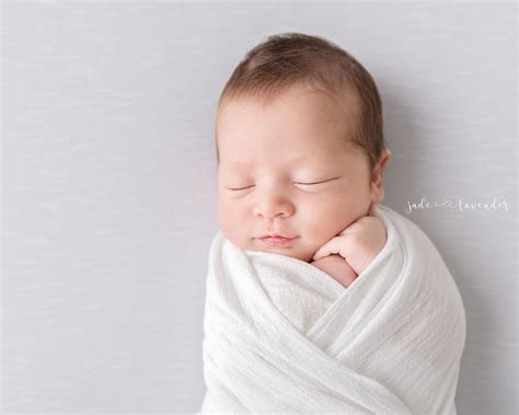 40 Newborn Photo Ideas for Boys & Girls at Home or Studio