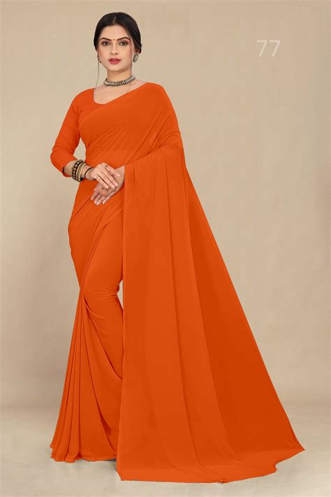 georgette weightless dark orange saree with grain texture – Stava ...