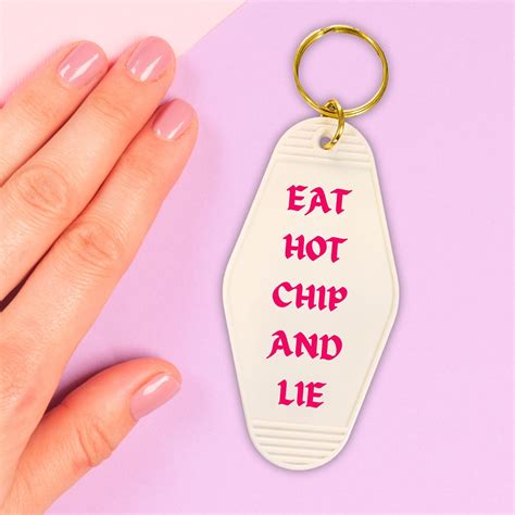 Eat Hot Chip and Lie Motel Style Keychain in White - The Bullish Store