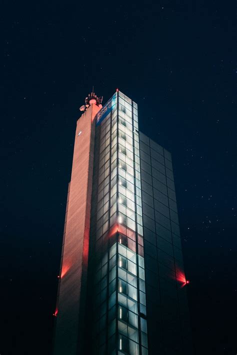 Download wallpaper 800x1200 building, skyscraper, architecture, night ...