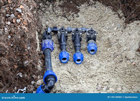 Installing Underground Sprinkler System 2 Stock Image - Image of ...