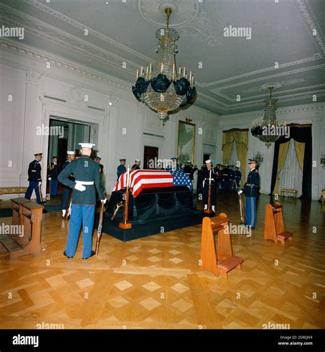 The late President John F. Kennedy lies in repose in the East Room of ...