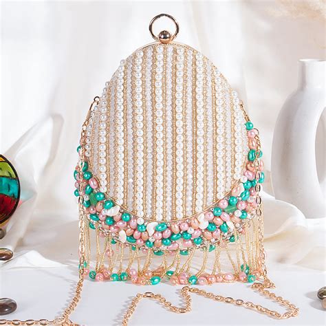 EMBROIDERED CLUTCHES – Swisni