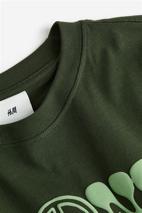 Loose Fit Printed T-shirt - Khaki green/Zone of Peace - Men | H&M IN