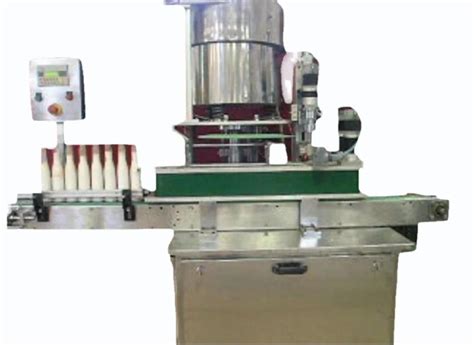 Capping Machines - Automatic Oil Filling Capping Machines Manufacturer ...