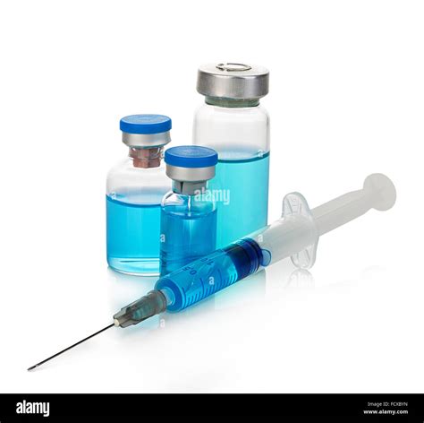 Sterile medical vials with blue medication solution, ampoules, and ...