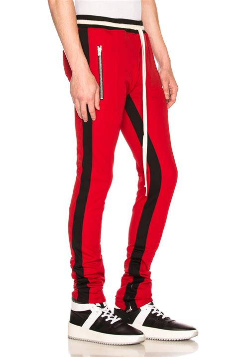 Fear of God Double Knit Double Stripe Track Pant in Red & Black | FWRD